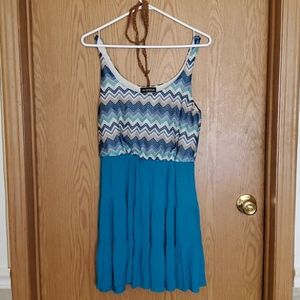 Blue design dress. Belt included.